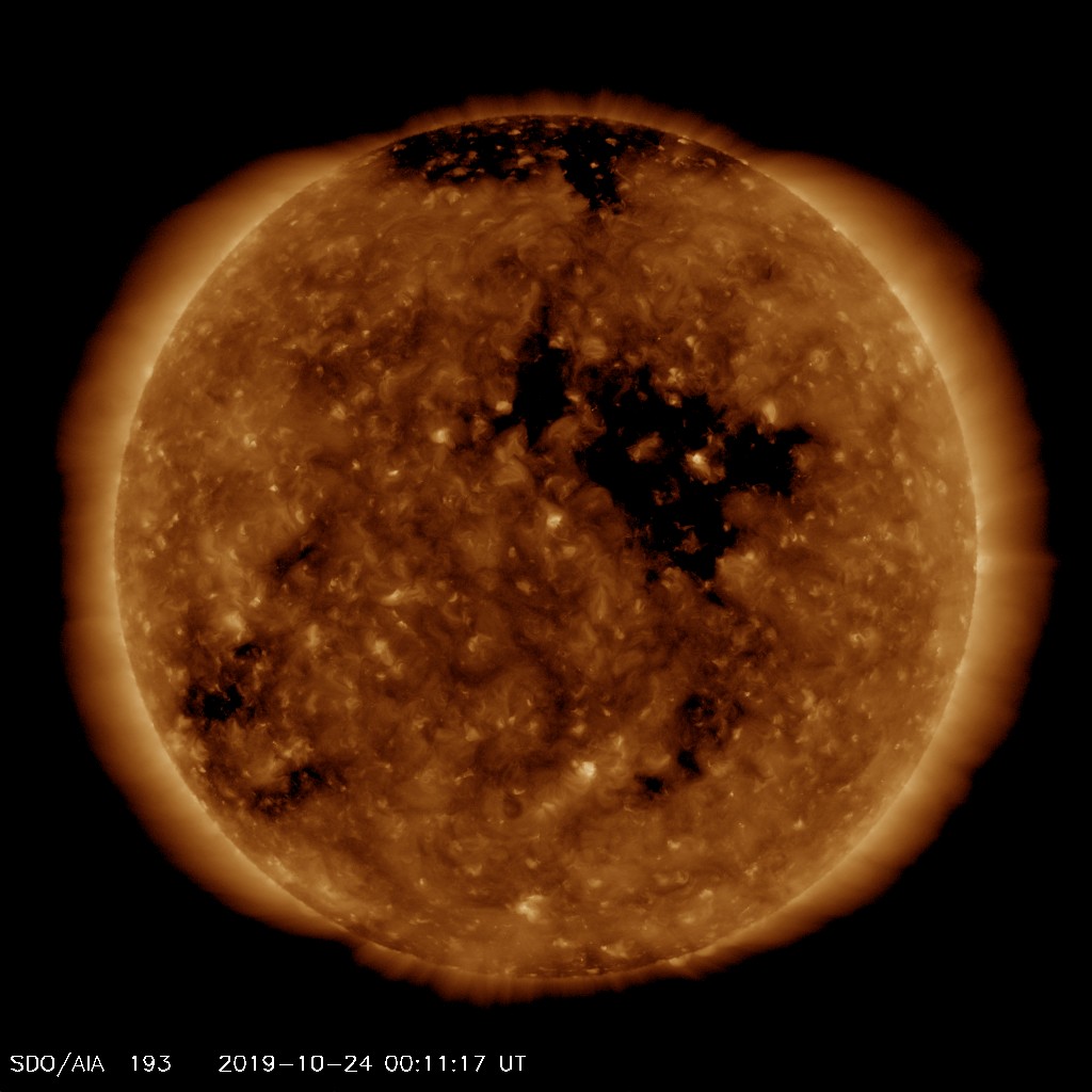 EUV image from SDO satellite showing the large, equatorial coronal hole  responsible for the anticipated storm events (black area of the Sun). Image from SDO (NASA).