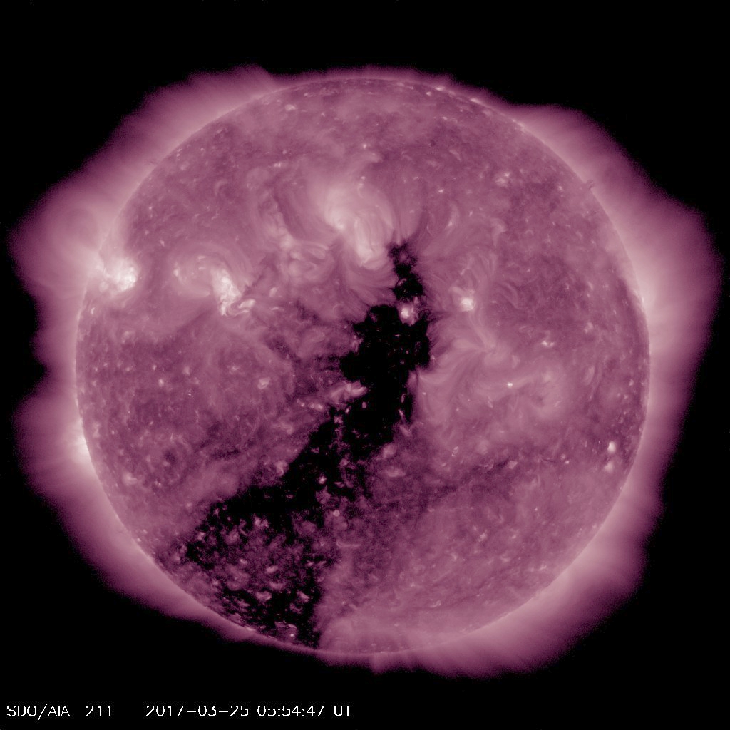 Image of the Sun from the Solar Dynamic Observatory. The coronal hole is the dark area in the centre. (SDO/NASA)