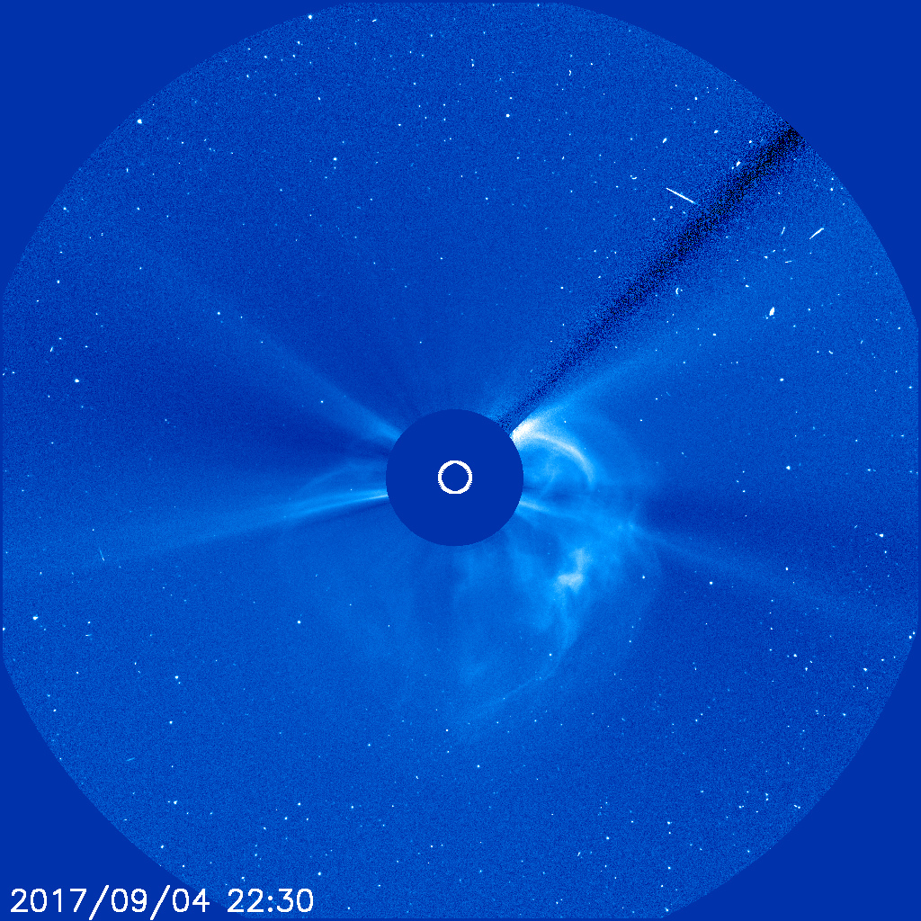 Image of the Sun's corona showing the CME. The Sun is behind the occulting disc. (SOHO NASA/ESA)