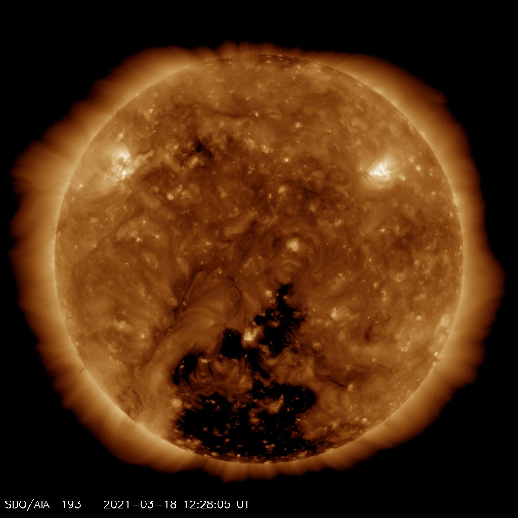 EUV image from SDO satellite showing the large northern extension of the southern polar coronal hole  responsible for the anticipated storm events (black area of the Sun). Image from SDO (NASA).