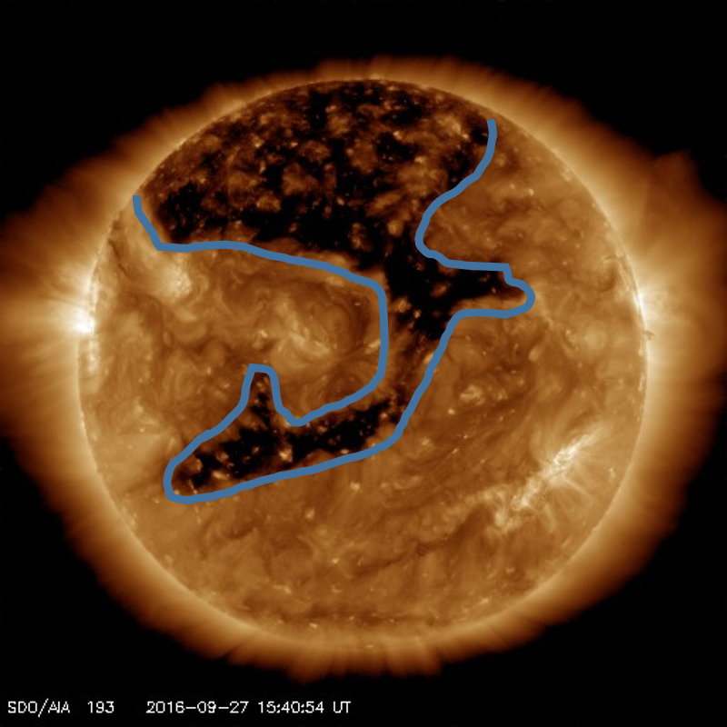 Image of the Sun from the Solar Dynamic Observatory with the coronal hole highlighted. (SDO/NASA)